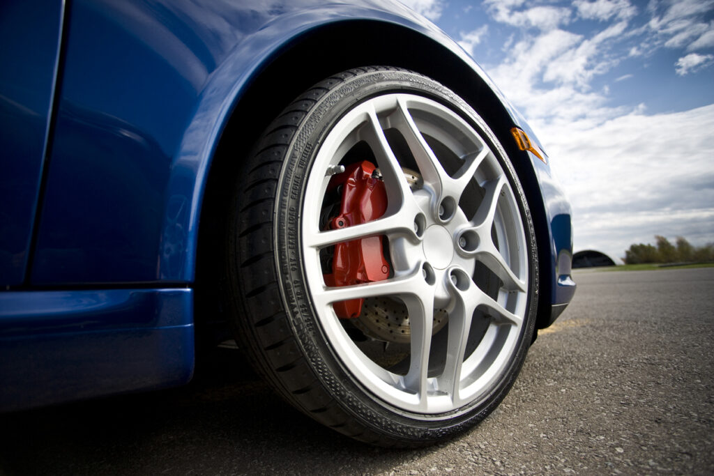 Rims of a race car at the track