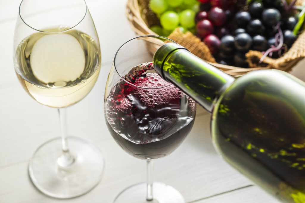 Pour the wine into the glass