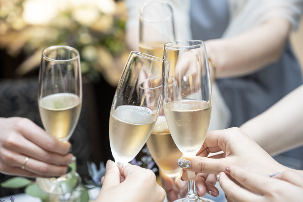 I took a picture of the women's hands when toasting at a wedding ceremony.