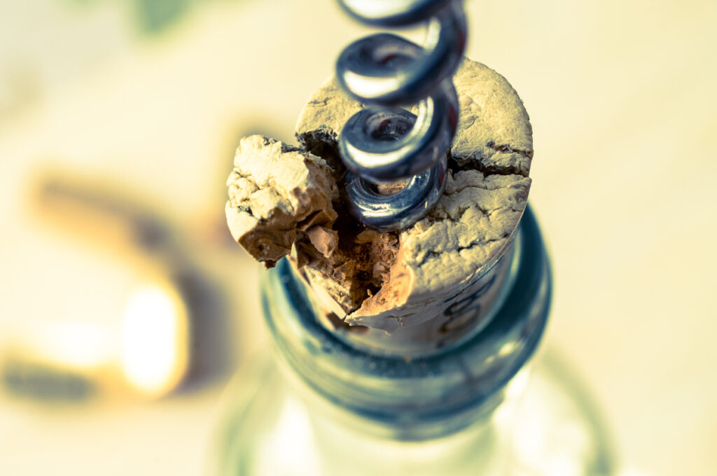 Incorrect opening wine corkscrew cork breaks