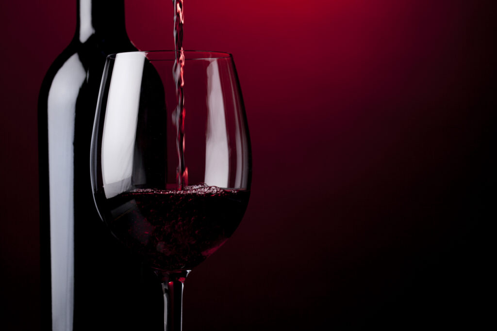 Pouring red wine